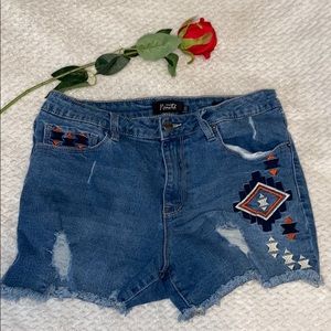 Mid-rise rip jean shorts